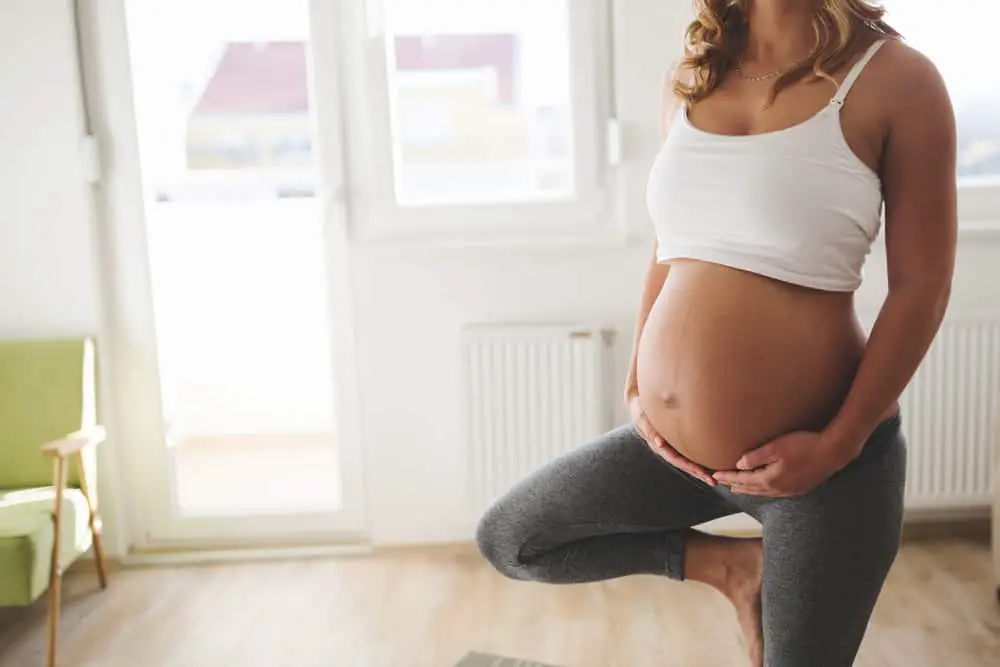 Pregnant Women Doing Yoga